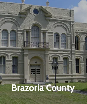 Historic Brazoria County courthouse with its light stone façade, arched windows, and central entrance, representing Brazoria County and access to Brazoria County court records.