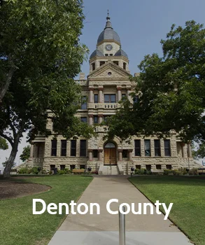 Front view of the Denton County courthouse with its ornate stonework and clock tower, symbolizing Denton County and its appraisal district services.