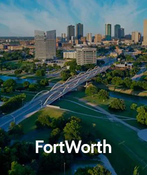 Fort Worth city skyline with high-rise buildings and green spaces, reflecting the city's urban expansion and the importance of managing property tax burdens.