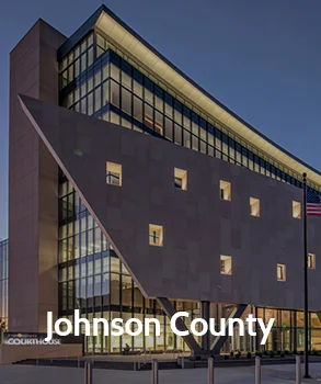 Johnson County courthouse with modern glass and angular design, representing the county’s innovation and civic development.