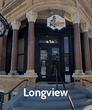 Longview, Texas downtown with its mix of modern buildings and historic charm, where property owners face the challenge of balancing development with increasing tax bills.