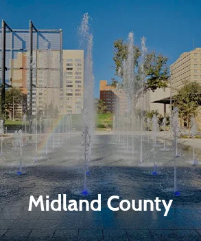 Downtown Midland County with fountains and city buildings, representing Midland County’s urban landscape and business district.