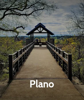 Scenic walking bridge in Plano, Texas, surrounded by residential communities, reflecting the city’s growth and the importance of addressing property tax assessments.