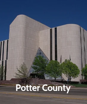 Potter County courthouse with modern, angular architecture featuring a triangular entrance, representing Potter County’s legal and governmental services.
