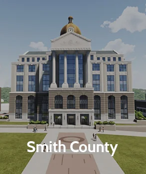 The Smith County courthouse with its sleek glass structure and iconic dome, standing as a landmark for legal services in the county.