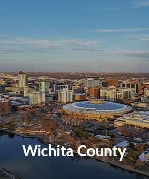 Aerial view of Wichita County with the city skyline, featuring the river and local landmarks.