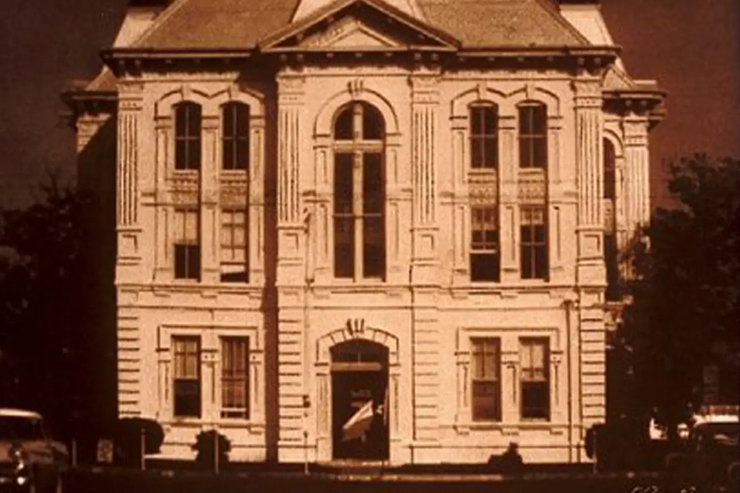 Historic Texas county courthouse with ornate architecture, symbolizing property tax protest and appeal services by Tax Cutter.