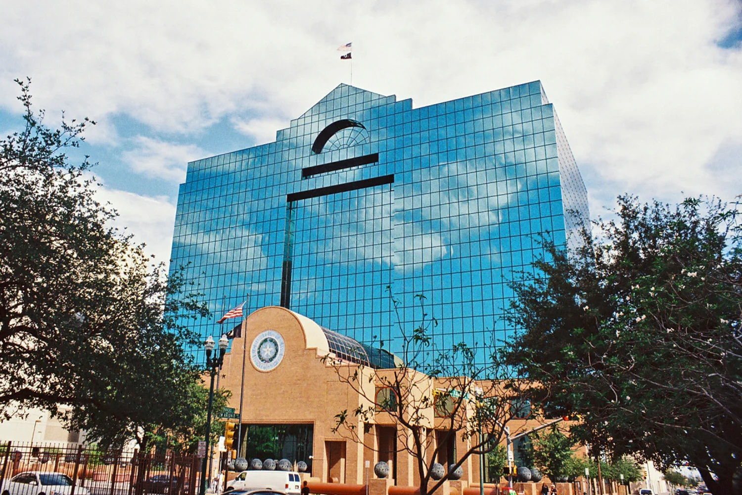 El Paso County administrative building in Texas with modern glass architecture, representing professional property tax protest services by Tax Cutter.